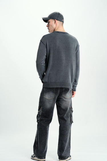 Black wash workwear cargo jeans by Bonkers Corner with multiple utility pockets and relaxed fit, made for durable casual wear.