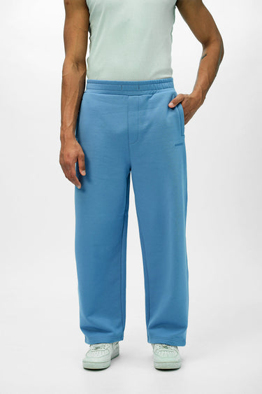 Blue Bonkers Corner everyday joggers shown on a model, featuring a relaxed fit and elastic waistband for casual comfort.
