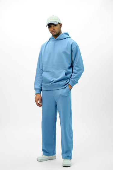 Blue Bonkers Corner everyday joggers shown on a model, featuring a relaxed fit and comfortable elastic waistband.