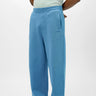 Blue Bonkers Corner everyday joggers made of soft fabric, displayed flat with elastic waistband and cuffs.