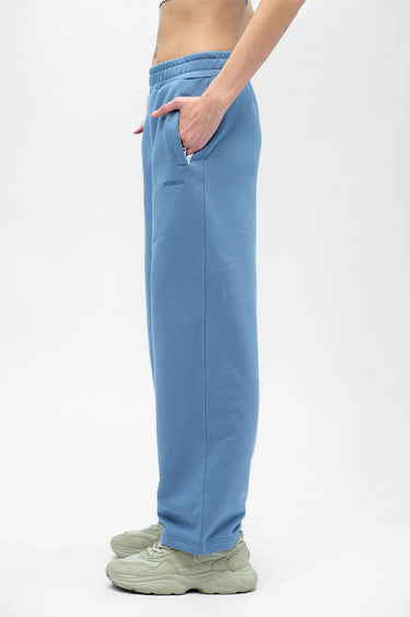 Blue Bonkers Corner everyday joggers made of soft, comfortable fabric, shown folded with a relaxed fit and elastic waistband.