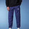 Blue heavyweight joggers by Bonkers Corner, showing the relaxed fit and soft fabric on a plain background.