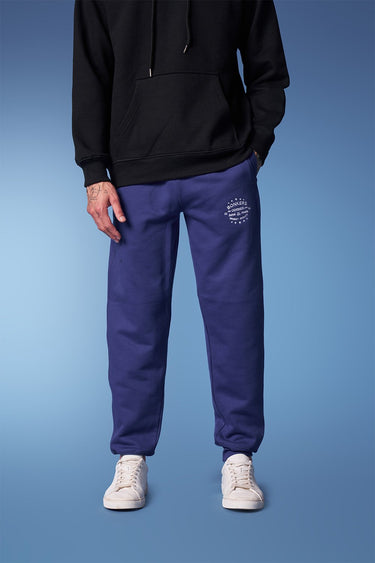Blue heavyweight joggers from Bonkers Corner featuring a comfortable fit and casual style, shown laid flat.