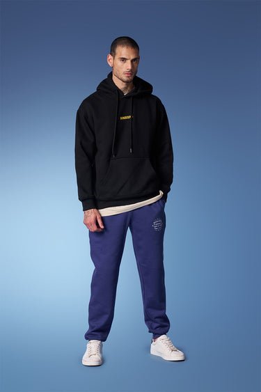 Blue heavyweight joggers by Bonkers Corner, showing a comfortable fit and casual style in soft, durable fabric.