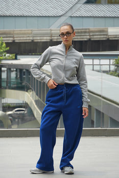Blue Bonkers Corner On The Go Joggers shown flat with elastic waistband and side pockets, casual sporty style.