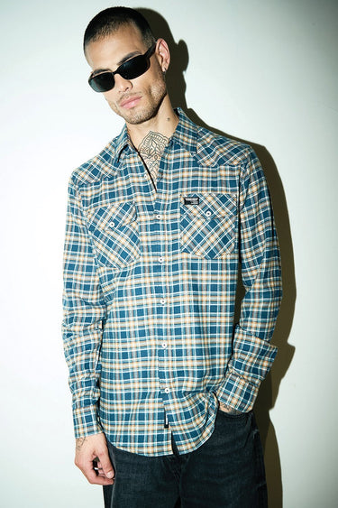 Blue Prussian regular fit shirt by Bonkers Corner, shown on a hanger with a collar and long sleeves.