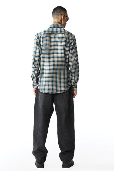 Blue Prussian regular fit shirt by Bonkers Corner, shown on a hanger with details of the collar and button closures.