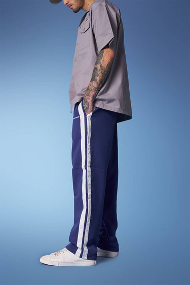 Blue sporty straight fit pants by Bonkers Corner, featuring a comfortable athletic style with a relaxed fit.