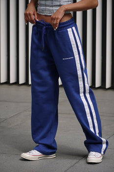 Blue sporty straight fit pants from Bonkers Corner, casual athletic style with a comfortable waistband and tapered leg design.