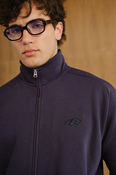 Blue Void high neck zipper jacket by Bonkers Corner, shown with front view and full-length zipper detail.