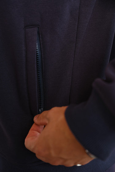 Blue Void High Neck Zipper Jacket by Bonkers Corner, featuring a sleek design and high collar, displayed on a plain background.