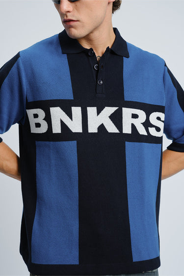 Bonkers Corner BNKRS Legacy Knit Polo shirt in light blue, featuring a classic collar and knit texture.
