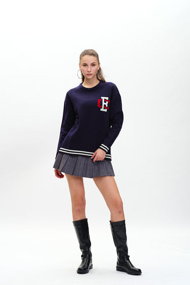 Bonkers Corner varsity crewneck sweatshirt in gray with ribbed cuffs and collar, featuring a classic collegiate style.