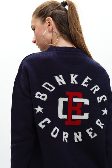 Bonkers Corner varsity crewneck sweatshirt in XS with striped collar and cuffs, casual and comfortable for everyday wear.