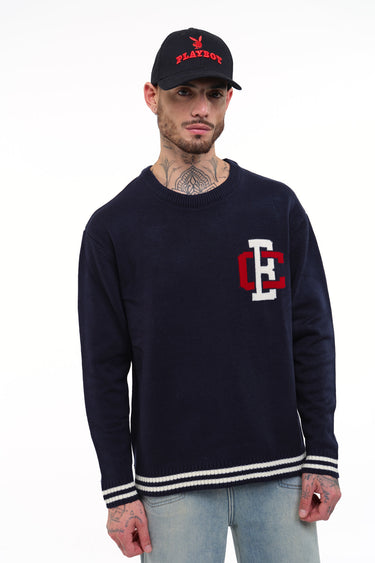Bonkers Corner varsity crewneck sweatshirt in light blue with contrasting striped collar and cuffs, casual and comfortable fit.