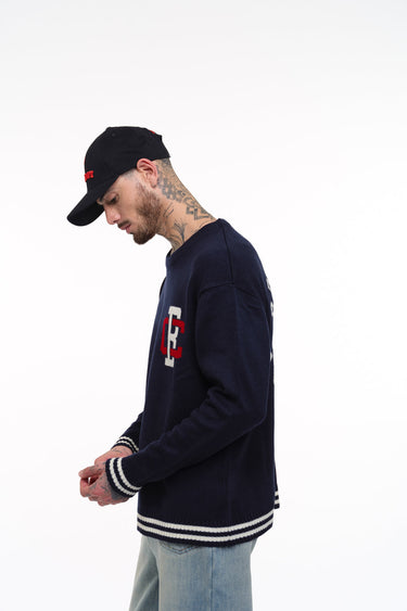 Bonkers Corner varsity crewneck sweatshirt in XS with striped ribbed collar and cuffs, casual style, navy and white colors.