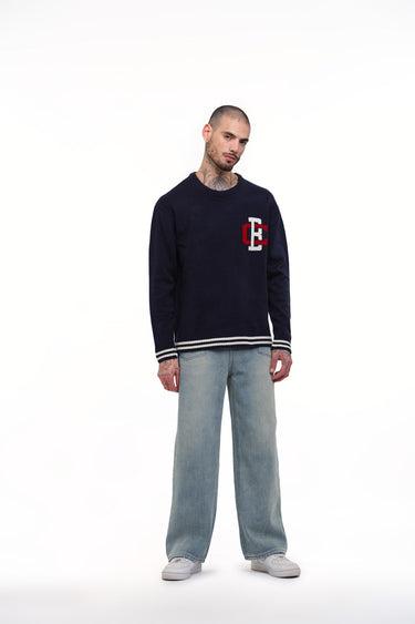 Bonkers Corner varsity crewneck sweatshirt in XS with striped cuffs and collar, casual and comfortable for everyday wear.