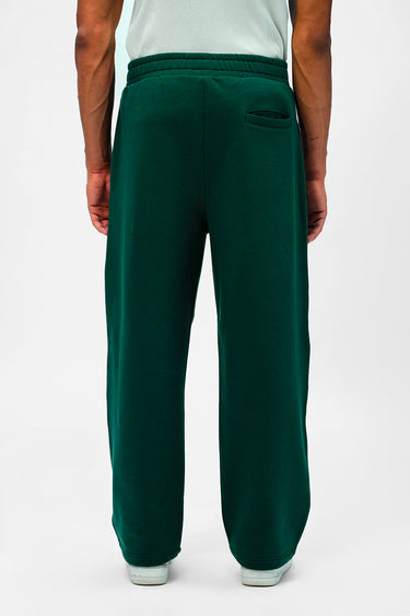 Bottle green Bonkers Corner everyday joggers shown on a model, featuring a relaxed fit and comfortable elastic waistband.