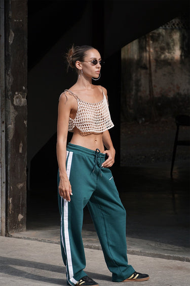 Bonkers Corner bottle green sporty straight-fit pants displayed with waistband and pockets visible.