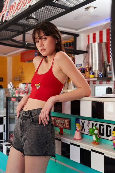Red Bratty Pickles cami top by Bonkers Corner, featuring lightweight fabric and spaghetti straps, displayed on a hanger.