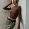Brown full sleeves polyamide top from Bonkers Corner, shown on a hanger with a close-up of fabric texture and design details.