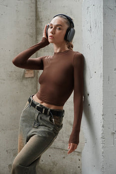 Brown full sleeves polyamide top from Bonkers Corner, shown on a hanger with a close-up of fabric texture and design details.