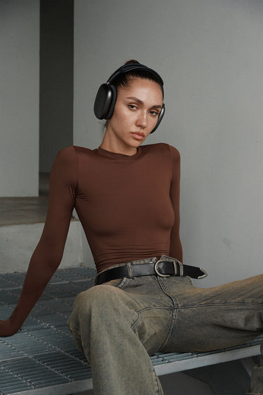 Brown full-sleeve polyamide top by Bonkers Corner, showcasing a fitted design and smooth fabric texture.