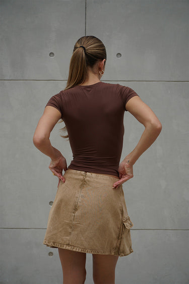 Brown Bonkers Corner polyamide fitted T-shirt displayed on a model, showcasing slim fit and casual style.