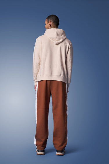 Brown sporty straight fit pants by Bonkers Corner, featuring a casual design and comfortable fit for active wear.