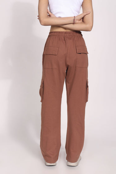 Brown utility straight fit pants by Bonkers Corner, shown on a model, featuring functional pockets and a classic straight-leg design.