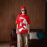 Red Bugs Bunny oversized T-shirt by Bonkers Corner featuring a graphic of Bugs Bunny on the front.