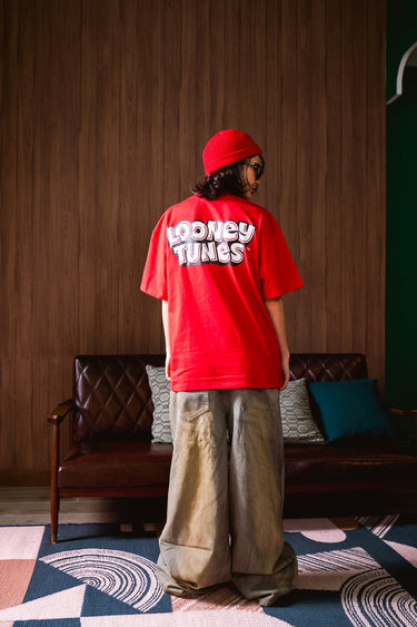 Red Bugs Bunny oversized T-shirt by Bonkers Corner featuring a cartoon image of Bugs Bunny on the front.