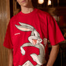 Red oversized Bugs Bunny T-shirt by Bonkers Corner, featuring a cartoon Bugs Bunny graphic on front.