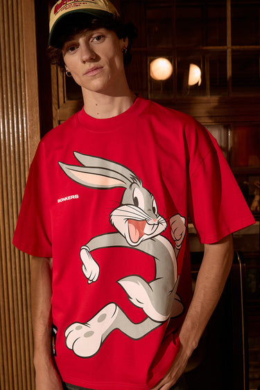 Red oversized Bugs Bunny T-shirt by Bonkers Corner, featuring a cartoon Bugs Bunny graphic on front.