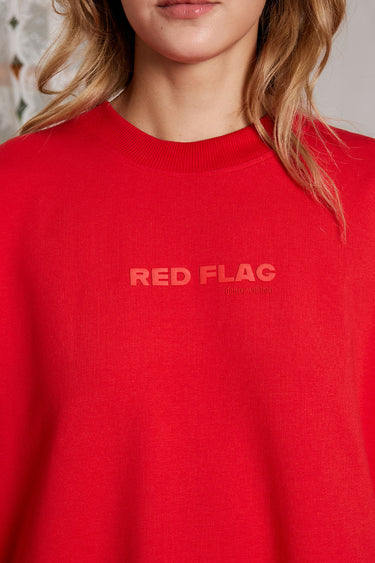 Bonkers Corner oversized red flag T-shirt, certified, with bold red flag graphic on front, relaxed fit, casual streetwear style.