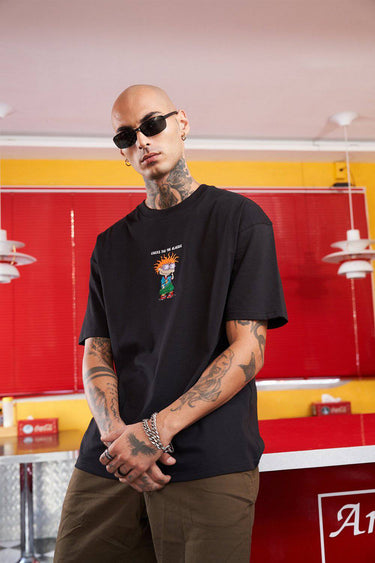 Bonkers Corner oversized T-shirt with Chuckie embroidery, featuring a relaxed fit and colorful character design.