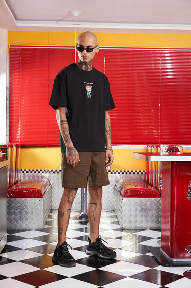 Bonkers Corner Chuckie embroidery oversized T-shirt featuring a colorful Chuckie graphic on soft fabric.