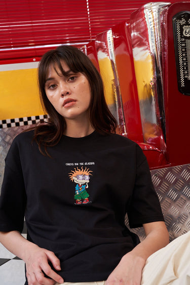 Bonkers Corner Chuckie embroidery oversized T-shirt featuring a colorful cartoon character design on soft fabric.