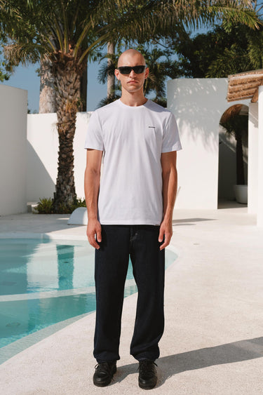 Bonkers Corner classic white 100% Supima cotton relaxed fit T-shirt, casual and comfortable, shown on a model.