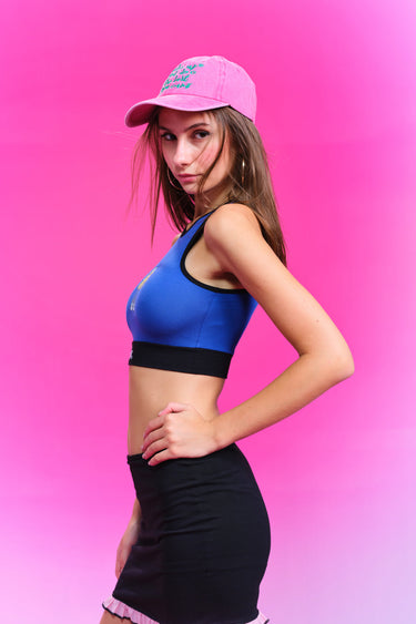 Bonkers Corner Cloe Crop Sports Tank in XS, showing a fitted athletic tank top with a rounded neckline and sleeveless design.