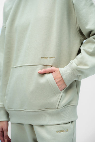 Bonkers Corner Cloudy Wear A Hug oversized hoodie in soft gray with a relaxed fit, perfect for cozy casual wear.