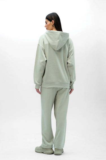 Bonkers Corner Cloudy Wear A Hug oversized hoodie in soft gray fabric, displayed on a hanger with a cozy, relaxed fit.
