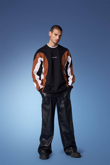 Bonkers Corner colourblock cut and sew crewneck sweatshirt in bright, bold fabric with a relaxed fit and ribbed cuffs.