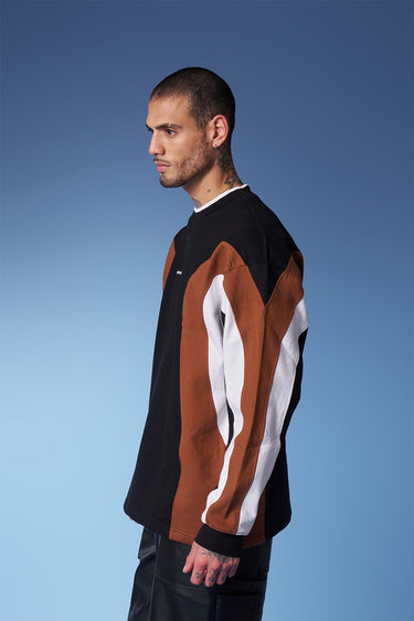 Bonkers Corner colourblock cut and sew crewneck sweatshirt in vibrant shades, featuring a relaxed fit and bold color blocking design.
