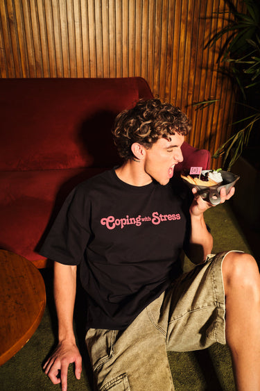 Bonkers Corner oversized T-shirt with "Coping With Stress" slogan in black, relaxed fit, casual style, on a plain background.