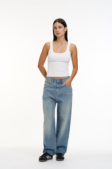 Crisp blue wide-leg jeans by Bonkers Corner, featuring a relaxed fit and classic denim texture.