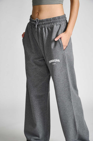 Dark grey melange wide-leg pants by Bonkers Corner, showing the relaxed fit and soft fabric texture.