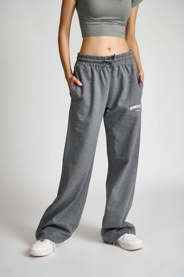 Dark grey melange wide-leg pants by Bonkers Corner, showing the relaxed fit and soft fabric texture.