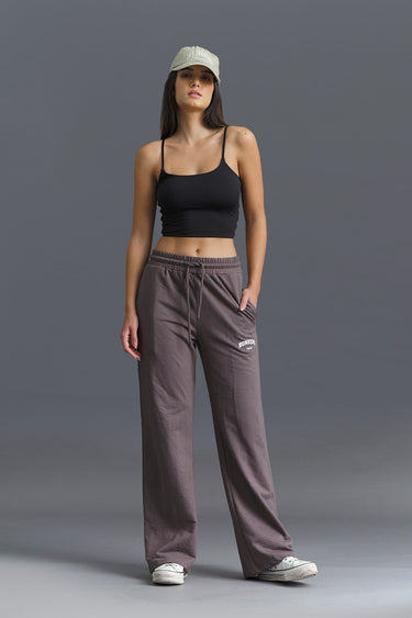Dark Shadow wide-leg sweatpants by Bonkers Corner featuring a relaxed fit and soft fabric, shown on a model.