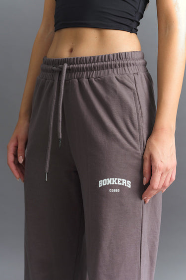 Dark Shadow wide-leg sweatpants by Bonkers Corner, relaxed fit with elastic waistband, shown on a mannequin.
